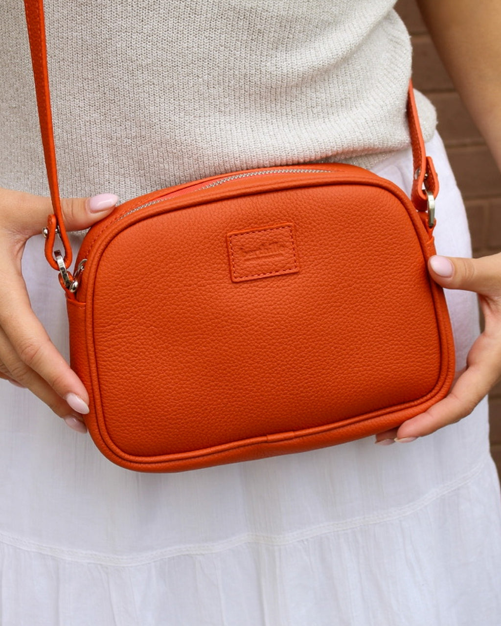 Minaudière cuir orange butano bandoulière Berthille