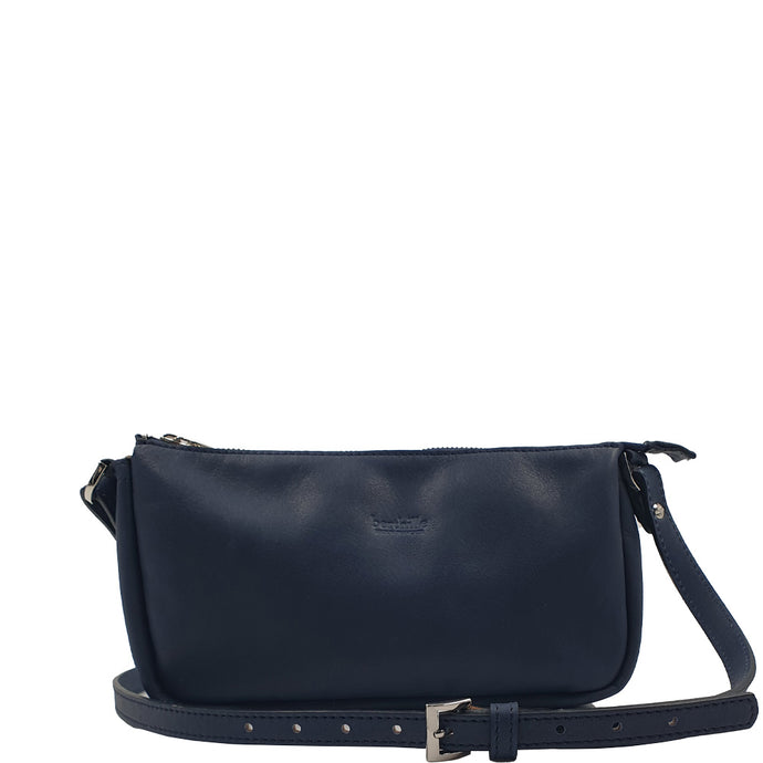Pochette bandoulière en cuir gras bleu jean. Petit sac chic et pratique, au cuir souple qui se patine avec le temps. Fabrication artisanale française.
